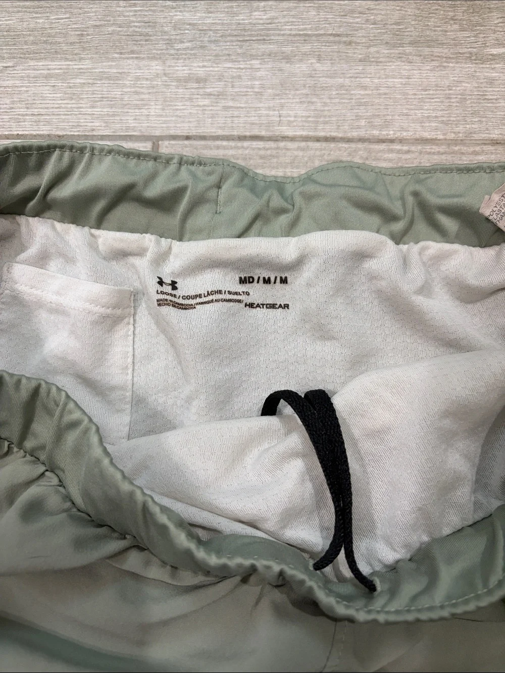 Under Armour Women's Sage Green Athletic Shorts with Black Trim